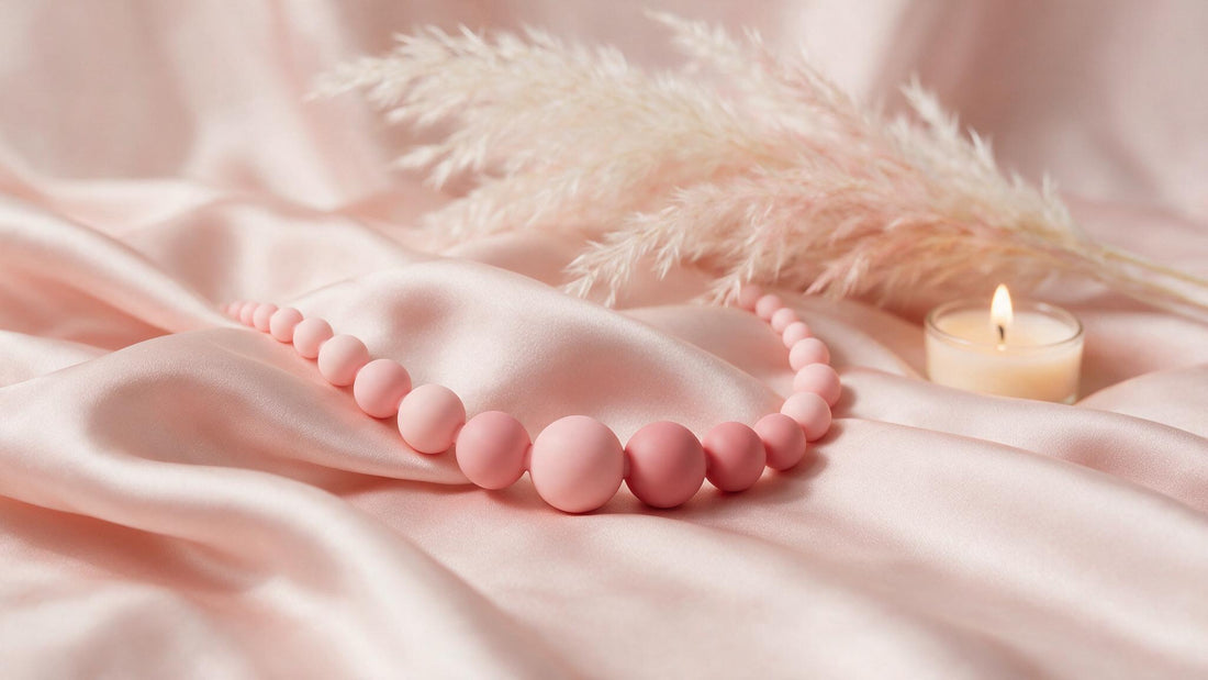 Chapelet anal : perles roses progressives sur satin, guide 2026 Everymiss